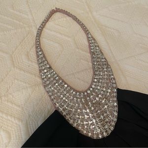 LM Collection strapless black knit dress with attached sequin “necklace “.